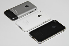 3 iPhones white background