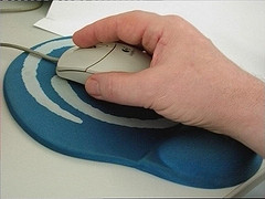 hand with computer mouse