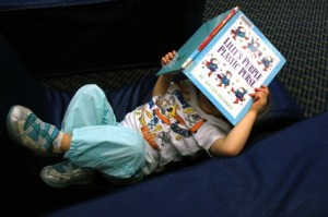 Toddler Reading a book resized