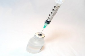 syringe and vaccine resized