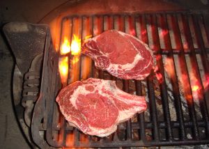 steaks on a grill