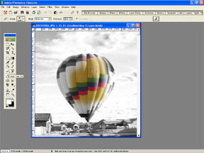 Erasing to add color in the hot air balloon